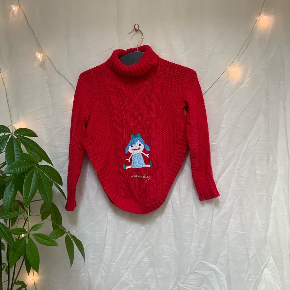 Painted red turtle neck sweater